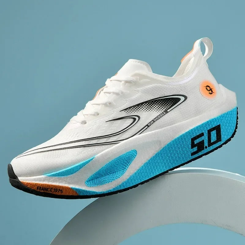 White running shoe with blue sole on a light blue background