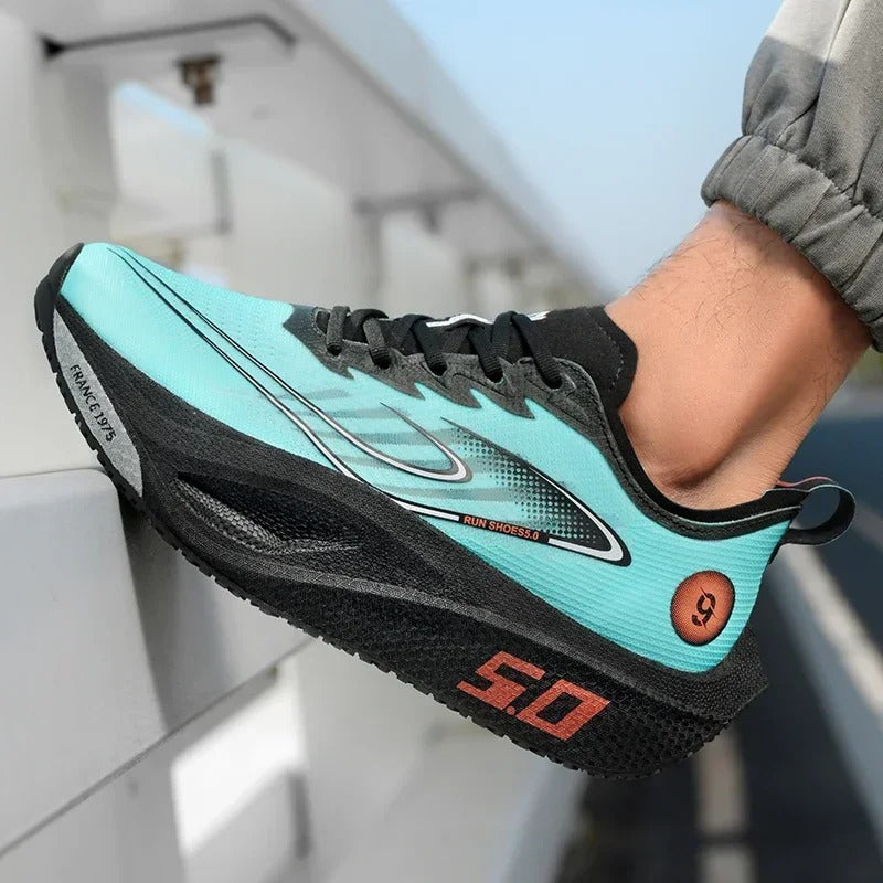 Turquoise and black running shoe with brand logo on a blurred background